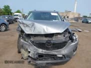 ✅ 2015 Mazda CX-5 Grand Touring • VIN: JM3KE4DY1F0530950 • Лот: 42425362. Опубликован ранее на IAAI с пробегом 120 088 миль. Бесплатный доступ к архиву аукционных продаж из США и подробный отчёт об истории автомобиля на DreamBid. Изображение 12.