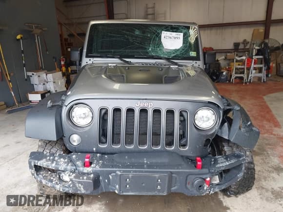 ✅ 2017 Jeep Wrangler Unlimited Rubicon Recon • VIN: 1C4BJWFG5HL687757 • Lot: 42367095. Listed on IAAI with 48,441 mi. Free auction sales archive from the USA and detailed vehicle history report at DreamBid. Image 12.