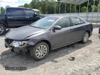 2013 Toyota Camry L with VIN 4T1BF1FKXDU274287, listed as a Copart auction lot 68620185 with 222,556 mi miles and Salvage title. Bid and sale history available at DreamBid. Image 1.