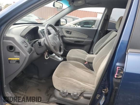 2005 Hyundai Tucson GLS z VIN KM8JN72D85U131798, wystawiony jako Copart lot #79274634 z przebiegiem 122 271 mil mil oraz Szkoda całkowita • Salvage title. Historia ofert i sprzedaży dostępna na DreamBid. Obrazek 7.