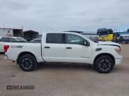 ✅ 2017 Nissan Titan SV • VIN: 1N6AA1E53HN537792 • Lot: 43848214. Listed on IAAI with 157,659 mi. Free auction sales archive from the USA and detailed vehicle history report at DreamBid. Image 14.