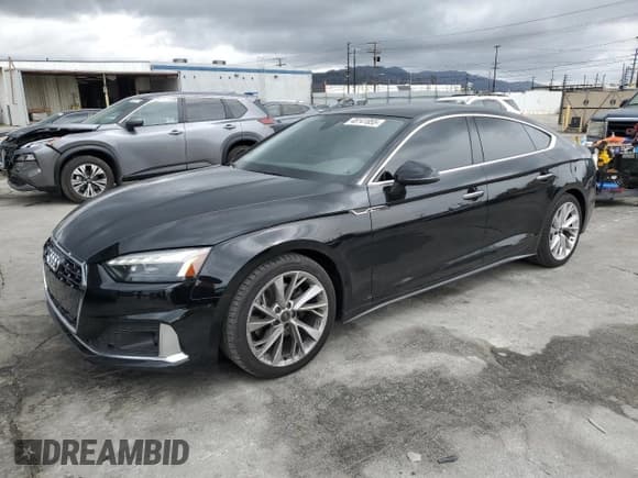✅ 2023 Audi A5 Sportback Premium • VIN: WAUABCF50PA026120 • Lot: 48141855. Listed on Copart with 38,272 mi. Free auction sales archive from the USA and detailed vehicle history report at DreamBid. Image 1.
