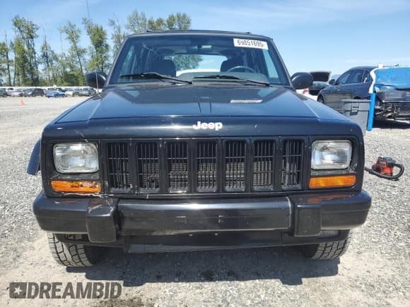 ✅ 1999 Jeep Cherokee Limited • VIN: 1J4FF78S7XL673913 • Lot: 69851695. Listed on Copart with 212,207 mi. Free auction sales archive from the USA and detailed vehicle history report at DreamBid. Image 5.