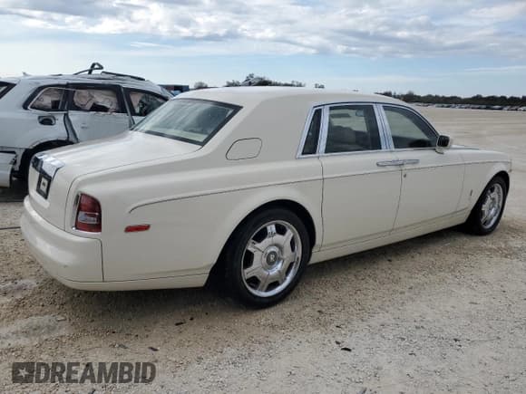 ✅ 2006 Rolls-Royce Phantom • VIN: SCA1S68476UX07887 • Лот: 77645064. Опубликован ранее на Copart с пробегом 38 002 миль. Бесплатный доступ к архиву аукционных продаж из США и подробный отчёт об истории автомобиля на DreamBid. Изображение 3.