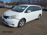 ✅ 2014 Toyota Sienna LE • VIN: 5TDKK3DC6ES478033 • Lot: 43649935. Listed on IAAI with 219,697 mi. Free auction sales archive from the USA and detailed vehicle history report at DreamBid. Image 2.