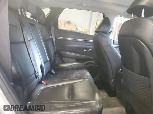 2022 Hyundai Tucson Luxury z VIN KM8JCCA1XNU028548, wystawiony jako Copart lot #80675655 z przebiegiem 100 097 mil mil oraz Szkoda całkowita • Salvage title. Historia ofert i sprzedaży dostępna na DreamBid. Obrazek 11.