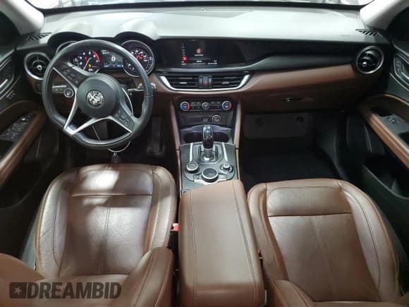 ✅ 2018 Alfa Romeo Stelvio • VIN: ZASFAKAN7J7C01195 • Lot: 82287485. Listed on Copart with 62,431 mi. Free auction sales archive from the USA and detailed vehicle history report at DreamBid. Image 8.