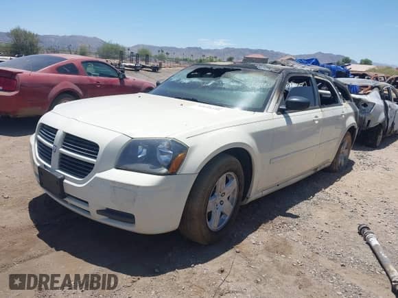 2005 Dodge Magnum SE с VIN 2D4FV48V95H562004, выставлен на аукционе IAAI как лот 42609295 с пробегом Не указан миль и . История ставок и продаж доступна на DreamBid. Изображение 2.