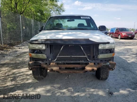 2002 Chevrolet Silverado 1500 LS z VIN 1GCEK14V32Z282564, wystawiony jako Copart lot #56330345 z przebiegiem 125 834 mil mil oraz Czysty tytuł • Clean title. Historia ofert i sprzedaży dostępna na DreamBid. Obrazek 5.