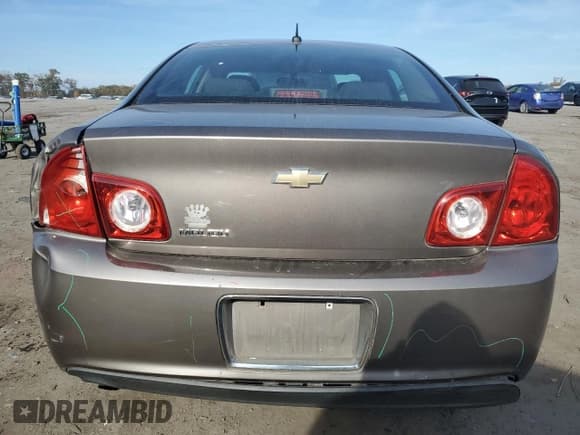 ✅ 2010 Chevrolet Malibu 1LS • VIN: 1G1ZB5EB2AF103775 • Lot: 77517804. Listed on Copart with 152,396 mi. Free auction sales archive from the USA and detailed vehicle history report at DreamBid. Image 6.