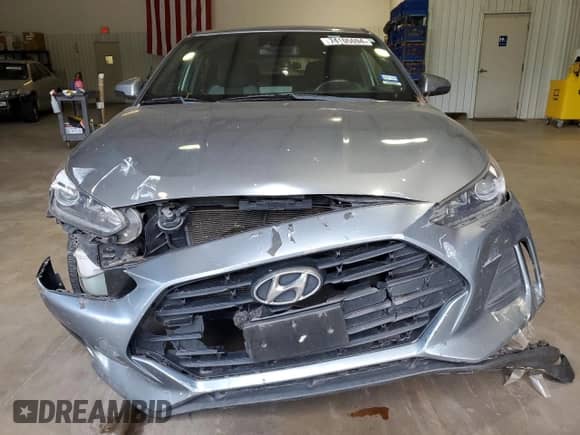 2019 Hyundai Veloster 2.0 с VIN KMHTG6AF3KU018563, выставлен на аукционе Copart как лот 74105094 с пробегом 75 578 миль миль и Списание • Salvage title. История ставок и продаж доступна на DreamBid. Изображение 5.