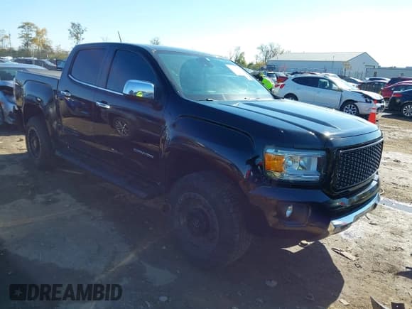 ✅ 2016 GMC Canyon 4WD SLT • VIN: 1GTG6DE30G1100045 • Lot: 43604177. Listed on IAAI with 110,503 mi. Free auction sales archive from the USA and detailed vehicle history report at DreamBid. Image 1.