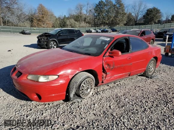 ✅ 1999 Pontiac Grand Prix GTP • VIN: 1G2WR5218XF202213 • Lot: 83345284. Listed on Copart with 215,907 mi. Free auction sales archive from the USA and detailed vehicle history report at DreamBid. Image 1.
