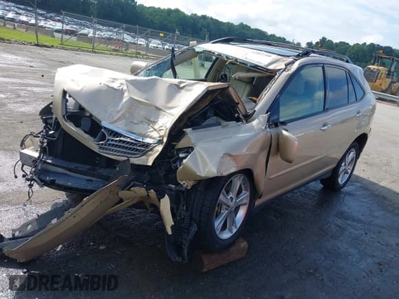 ✅ 2008 Lexus RX 400h • VIN: JTJGW31U982006067 • Lot: 42461500. Listed on IAAI with 108,559 mi. Free auction sales archive from the USA and detailed vehicle history report at DreamBid. Image 2.