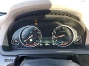 ✅ 2015 BMW 7 Series 750i • VIN: WBAYA8C53FGK19778 • Lot: 77258684. Listed on Copart with 34,535 mi. Free auction sales archive from the USA and detailed vehicle history report at DreamBid. Image 9.