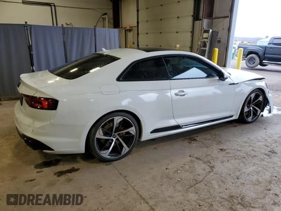 ✅ 2018 Audi RS 5 • VIN: WUAPWAF56JA905136 • Lot: 48261124. Listed on Copart with 27,626 mi. Free auction sales archive from the USA and detailed vehicle history report at DreamBid. Image 3.
