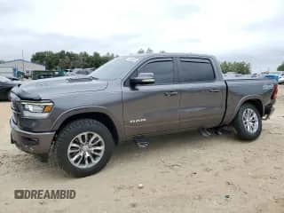 2022 Ram 1500 Laramie with VIN 1C6SRFJT9NN281954, listed as a Copart auction lot 90458075 with 52,245 mi miles and Salvage title. Bid and sale history available at DreamBid. Image 1.