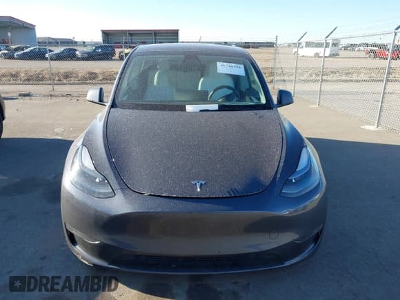 ✅ 2023 Tesla Model Y Long Range • VIN: 7SAYGAEEXPF714760 • Lot: 41748398. Listed on IAAI with 49,802 mi. Free auction sales archive from the USA and detailed vehicle history report at DreamBid. Image 13.