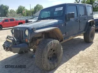 ✅ 2008 Jeep Wrangler Unlimited Rubicon • VIN: 1J8GA69198L550682 • Lot: 57333575. Listed on Copart with 176,224 mi. Free auction sales archive from the USA and detailed vehicle history report at DreamBid. Image 1.