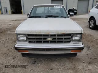 ✅ 1985 Chevrolet S-10 • VIN: 1GCCS14B0F2217537 • Лот: 54931415. Опубликован ранее на Copart с пробегом 453 455 миль. Бесплатный доступ к архиву аукционных продаж из США и подробный отчёт об истории автомобиля на DreamBid. Изображение 5.