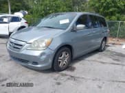 ✅ 2006 Honda Odyssey EX-L • VIN: 5FNRL38666B053689 • Lot: 43836082. Listed on IAAI with 171,596 mi. Free auction sales archive from the USA and detailed vehicle history report at DreamBid. Image 2.