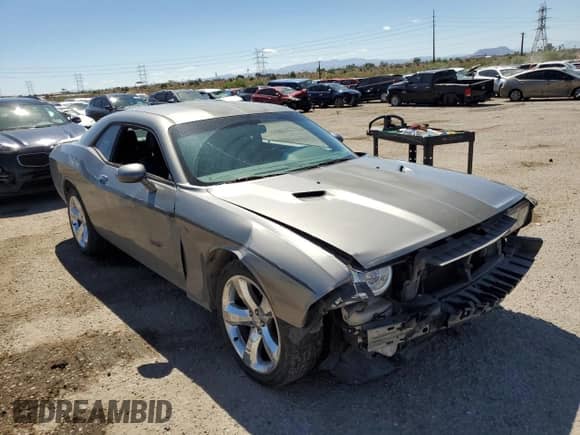 2012 Dodge Challenger SXT z VIN 2C3CDYAG4CH153576, wystawiony jako Copart lot #71494414 z przebiegiem 139 650 mil mil oraz Szkoda całkowita • Salvage title. Historia ofert i sprzedaży dostępna na DreamBid. Obrazek 4.