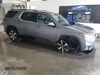 ✅ 2021 Chevrolet Traverse LT • VIN: 1GNEVHKW0MJ163892 • Lot: 68008594. Wystawiony na Copart z przebiegiem 78 566 mil. Bezpłatny archiwum sprzedaży aukcyjnych z USA i szczegółowy raport historii pojazdu na DreamBid. Zdjęcie 4.