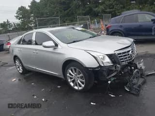 ✅ 2013 Cadillac XTS Luxury • VIN: 2G61P5S3XD9138972 • Lot: 43168746. Wystawiony na IAAI z przebiegiem 134 398 mil. Bezpłatny archiwum sprzedaży aukcyjnych z USA i szczegółowy raport historii pojazdu na DreamBid. Zdjęcie 1.