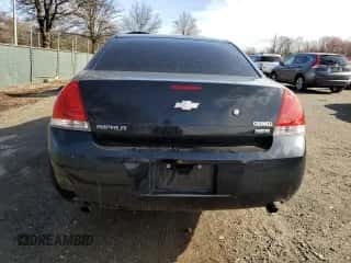 2013 Chevrolet Impala Police with VIN 2G1WD5E33D1263858, listed as a Copart auction lot 49270925 with 132,528 mi miles and Salvage title. Bid and sale history available at DreamBid. Image 6.
