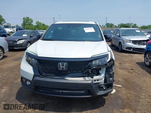 ✅ 2021 Honda Passport EX-L • VIN: 5FNYF8H59MB007097 • Lot: 42409181. Listed on IAAI with 74,410 mi. Free auction sales archive from the USA and detailed vehicle history report at DreamBid. Image 12.