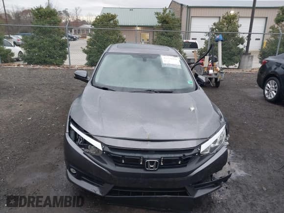 ✅ 2018 Honda Civic EX-T • VIN: JHMFC1F34JX029310 • Lot: 43770255. Listed on IAAI with 71,655 mi. Free auction sales archive from the USA and detailed vehicle history report at DreamBid. Image 12.