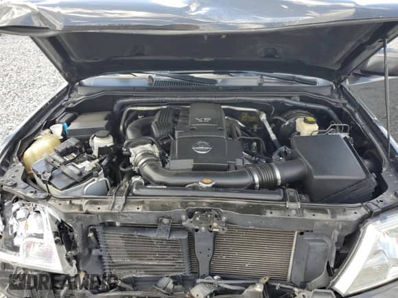 2015 Nissan Frontier SL z VIN 1N6AD0EVXFN717690, wystawiony jako Copart lot #90018345 z przebiegiem 74 467 mil mil oraz Szkoda całkowita • Salvage title. Historia ofert i sprzedaży dostępna na DreamBid. Obrazek 11.