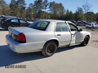 ✅ 2001 Ford Crown Victoria Police Interceptor • VIN: 2FAFP71W91X155494 • Лот: 89142975. Опубликован ранее на Copart с пробегом 116 633 миль. Бесплатный доступ к архиву аукционных продаж из США и подробный отчёт об истории автомобиля на DreamBid. Изображение 3.
