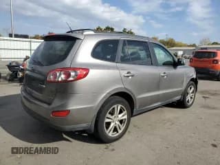 ✅ 2012 Hyundai Santa Fe SE • VIN: 5XYZHDAGXCG098035 • Lot: 75952204. Listed on Copart with 175,381 mi. Free auction sales archive from the USA and detailed vehicle history report at DreamBid. Image 3.