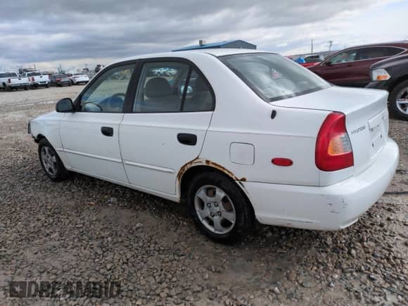 2002 Hyundai Accent GL z VIN KMHCG45C82U358523, wystawiony jako Copart lot #48247575 z przebiegiem 164 869 mil mil oraz Szkoda całkowita • Salvage title. Historia ofert i sprzedaży dostępna na DreamBid. Obrazek 2.