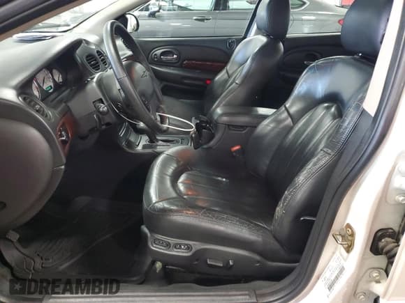 ✅ 2003 Chrysler 300M M • VIN: 2C3HE66G73H577060 • Lot: 69861115. Listed on Copart with 126,678 mi. Free auction sales archive from the USA and detailed vehicle history report at DreamBid. Image 7.