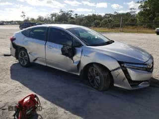 ✅ 2018 Honda Clarity Touring • VIN: JHMZC5F37JC021519 • Лот: 73116712. Опубликован ранее на Copart с пробегом Не указан. Бесплатный доступ к архиву аукционных продаж из США и подробный отчёт об истории автомобиля на DreamBid. Изображение 4.