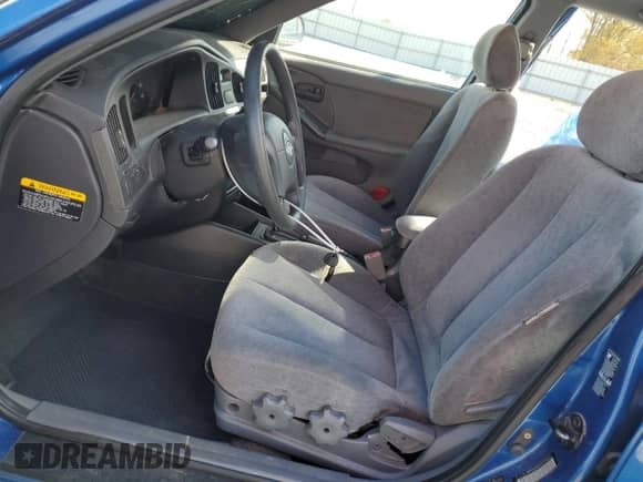 2005 Hyundai Elantra GLS с VIN KMHDN46D25U184521, выставлен на аукционе Copart как лот 82363924 с пробегом 99 125 миль миль и Списание • Salvage title. История ставок и продаж доступна на DreamBid. Изображение 7.