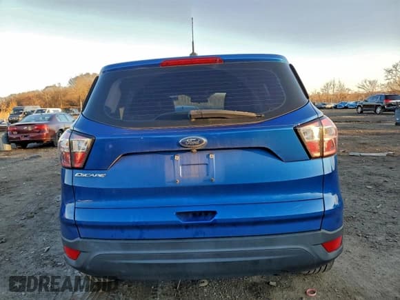 ✅ 2018 Ford Escape S • VIN: 1FMCU0F77JUA69621 • Lot: 95303675. Listed on Copart with 66,553 mi. Free auction sales archive from the USA and detailed vehicle history report at DreamBid. Image 6.