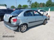 ✅ 2009 Kia Rio LX • VIN: KNADE223196444971 • Lot: 42856117. Wystawiony na IAAI z przebiegiem 95 000 mil. Bezpłatny archiwum sprzedaży aukcyjnych z USA i szczegółowy raport historii pojazdu na DreamBid. Zdjęcie 4.