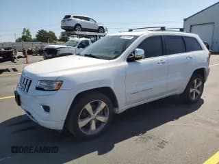 ✅ 2015 Jeep Grand Cherokee Overland • VIN: 1C4RJFCM4FC618516 • Lot: 58671455. Listed on Copart with 221,550 mi. Free auction sales archive from the USA and detailed vehicle history report at DreamBid. Image 1.