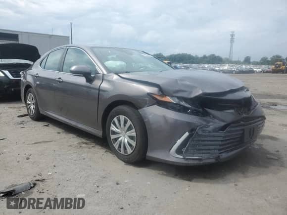 2022 Toyota Camry Hybrid LE с VIN 4T1C31AK2NU587467, выставлен на аукционе Copart как лот 81838845 с пробегом 59 909 миль миль и Списание • Salvage title. История ставок и продаж доступна на DreamBid. Изображение 4.