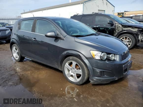 2014 Chevrolet Sonic LT z VIN 1G1JC6EH0E4209809, wystawiony jako Copart lot #51433635 z przebiegiem 127 868 mil mil oraz Czysty tytuł • Clean title. Historia ofert i sprzedaży dostępna na DreamBid. Obrazek 4.