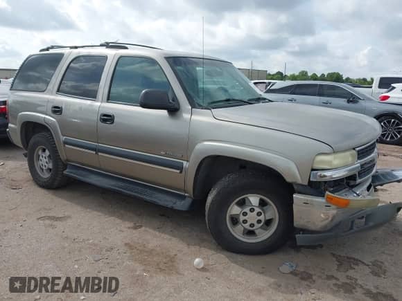 2002 Chevrolet Tahoe LS with VIN 1GNEC13Z42R246617, listed as a IAAI auction lot 42675524 with 306,596 mi miles and . Bid and sale history available at DreamBid. Image 1.