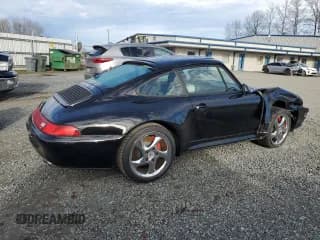 ✅ 1997 Porsche 911 • VIN: WP0AA2990VS320557 • Лот: 49679545. Опубликован ранее на Copart с пробегом 21 380 миль. Бесплатный доступ к архиву аукционных продаж из США и подробный отчёт об истории автомобиля на DreamBid. Изображение 3.