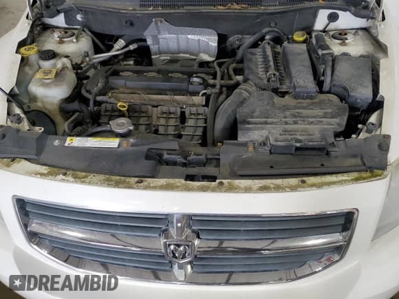 ✅ 2008 Dodge Caliber SXT • VIN: 1B3HB48B38D610457 • Лот: 87407074. Опубликован ранее на Copart с пробегом 139 515 миль. Бесплатный доступ к архиву аукционных продаж из США и подробный отчёт об истории автомобиля на DreamBid. Изображение 12.