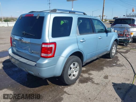 ✅ 2009 Ford Escape Hybrid • VIN: 1FMCU593X9KA93702 • Lot: 42855609. Listed on IAAI with 179,793 mi. Free auction sales archive from the USA and detailed vehicle history report at DreamBid. Image 4.