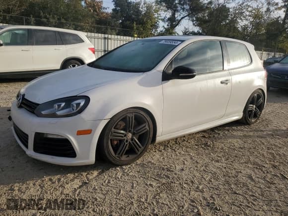 ✅ 2012 Volkswagen Golf R w/Sunroof & Navi • VIN: WVWRF7AJ4CW313656 • Лот: 79659554. Опубликован ранее на Copart с пробегом 125 728 миль. Бесплатный доступ к архиву аукционных продаж из США и подробный отчёт об истории автомобиля на DreamBid. Изображение 1.