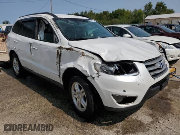 2012 Hyundai Santa Fe GLS с VIN 5XYZG3AB5CG134120, выставлен на аукционе Copart как лот 70640204 с пробегом Не указан миль и Списание • Salvage title. История ставок и продаж доступна на DreamBid. Изображение 4.
