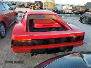 ✅ 1986 Ferrari Testarossa • VIN: ZFFSA17A5G0063021 • Lot: 75186264. Wystawiony na Copart z przebiegiem 14 606 mil. Bezpłatny archiwum sprzedaży aukcyjnych z USA i szczegółowy raport historii pojazdu na DreamBid. Zdjęcie 6.